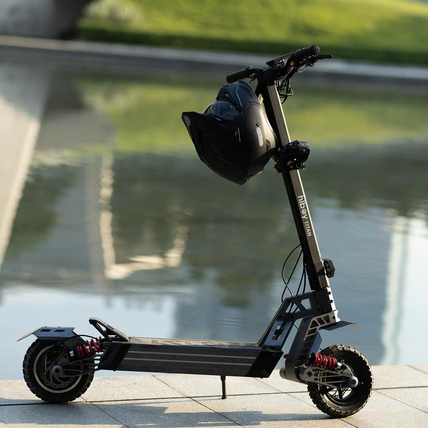 Hiboy Titan electric scooter by the pond