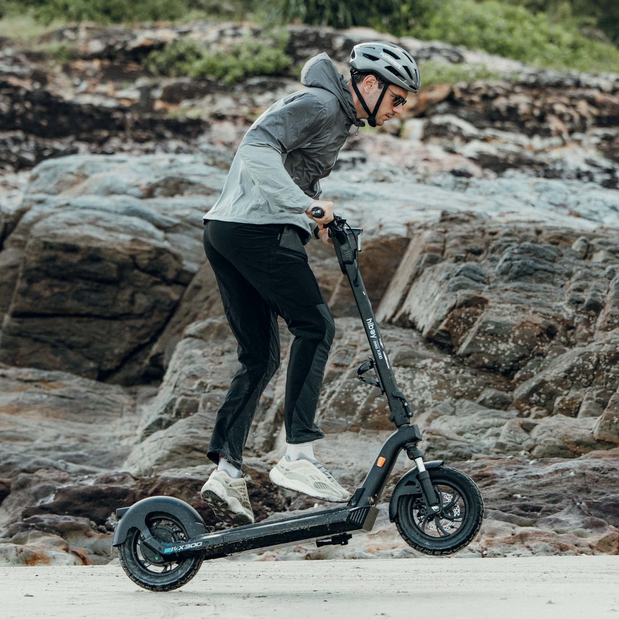 Rider using Hiboy X300 electric scooter for daily commuting